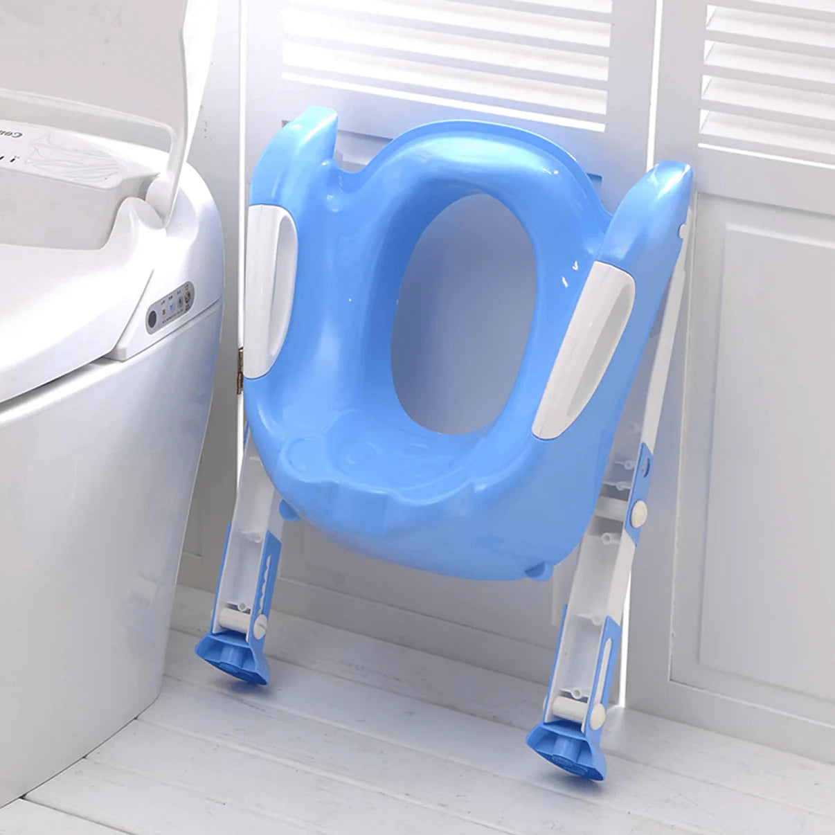 Dečiji adapter za WC šolju sa sklopivim stepenicama